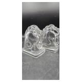 Glass horse head bookends.