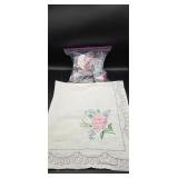 Vtg handmade tablecloth and bag of sewing notions.