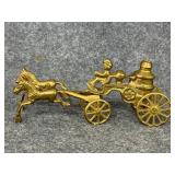vintage brass horse-drawn fire pump wagon