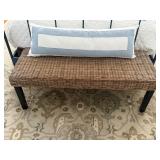 Wicker accent bench and pillow