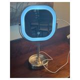 Makeup magnifying mirror with charging cord