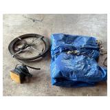 Tarp plumbers snake and sander