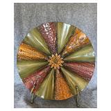 Metal home decor on stand