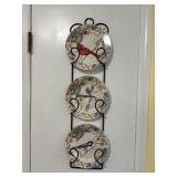 Plates on wall hanging holder