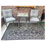 Outdoor table, chairs and rug