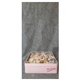 Tin of miniture christmas ornaments