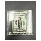 vintage The Shrinking Dollar paperweight 1970s