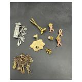 Assorted pins and brooches