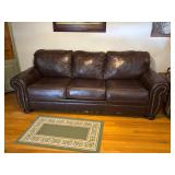 Flawed front from wheelchair scraping sofa