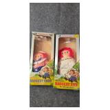 Raggedy ann and andy dolls on original boxes