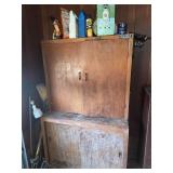 Wooden storage cabinet and contents