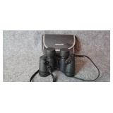 Vanguard binoculars with soft case.