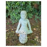 Concrete girl garden statue