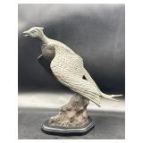 Vintage patinated flying pheasant