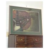 framed artwork features a musical-themed