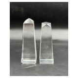 clear glass or crystal obelisk tower