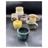 Assorted pottery mug and creamer lot