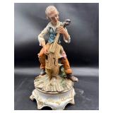 vintage Capodimonte musician playing a cello