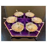 6 scallop salts on dolphin feet with spoons