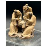 handcrafted Chinese mudman figurine