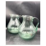 Pair of vintage green glass pitchers