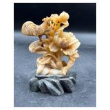 Vintage carved stone figure