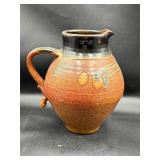 Vintage signed pottery pitcher