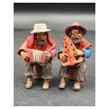 Vintage Clay folk art figurines stamped Merida
