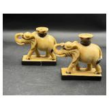 Vintage carved elephant figures candle holders