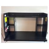 black wall-mounted floating desk