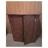 Wooden storage cabinet and contents