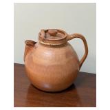 Flawed vintage pottery pitcher