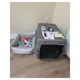 Pet carrier bed and toys