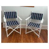 white-framed striped director's chairs