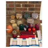 Assorted new and used candles