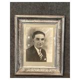 Black and white photo in ornate silver tone frame