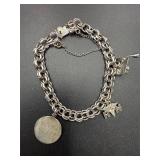 18 grams Sterling silver charm bracelet & charms