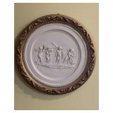 Plastic cherub medallion wall decor