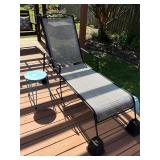 Lounge chair on risers & table