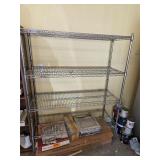 Metal storage shelf has bent pole