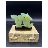 Vintage dragon carving on wooden stand