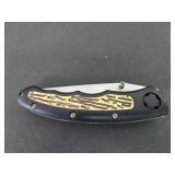 Frost Cutlery pocket knife small crack in handle