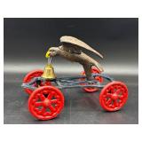 Vintage Cast Iron Eagle Bell Toy on Wheels