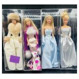 4 Loose Barbie Dolls