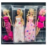 4 Loose Barbie Dolls