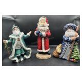 3 Colorful Christmas Santa Statues