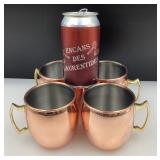 4 tasses cuivrées, avec poignées en laiton
