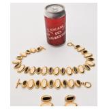 Ensemble collier, bracelet et boucles d'oreilles,