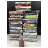 Lot de DVD variés et de jeux vidéos