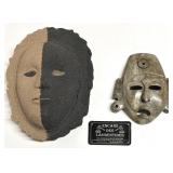 2 masques sculptï¿½s, en marbre et en sable